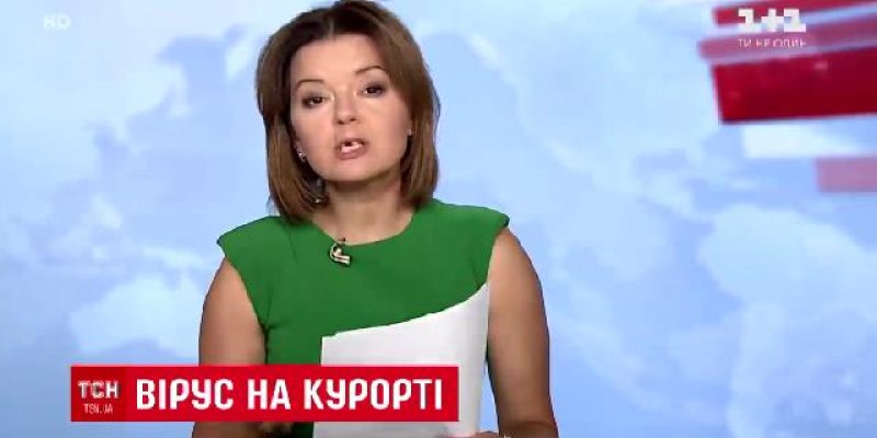 Unflustered Ukrainian news anchor loses tooth live on air